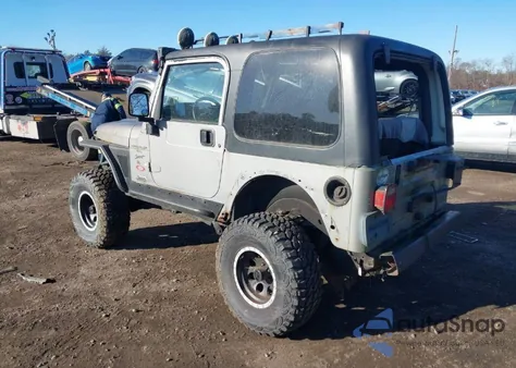 2000 Jeep Wrangler Sport z USA, uszkodzony, nr VIN 1J4FA49S1YP744786